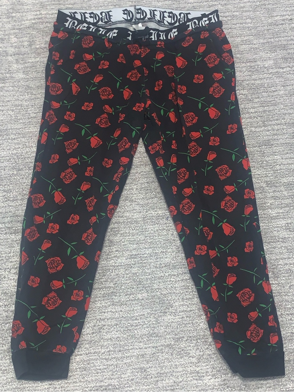Disney Beauty and the Beast Black Jogger Pants with Red Rose Print